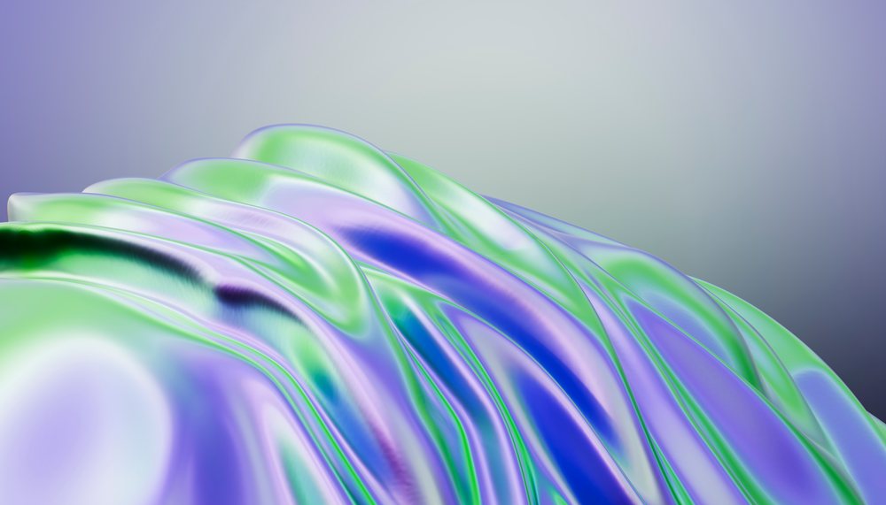 A smooth, flowing abstract surface with glossy green, blue, and purple colors blending in fluid wave shapes on a soft gradient background.