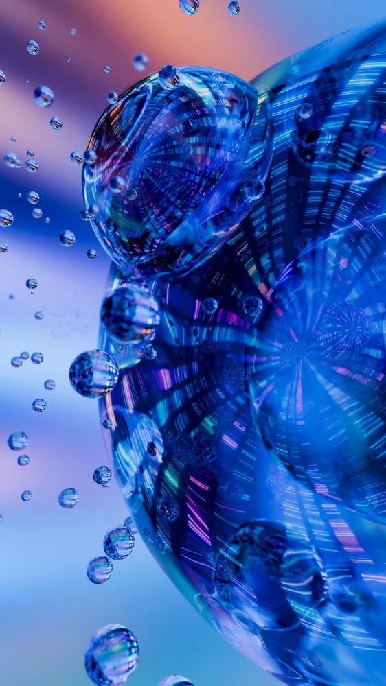 Water droplets cluster with colorful reflections and light patterns on a smooth liquid surface.