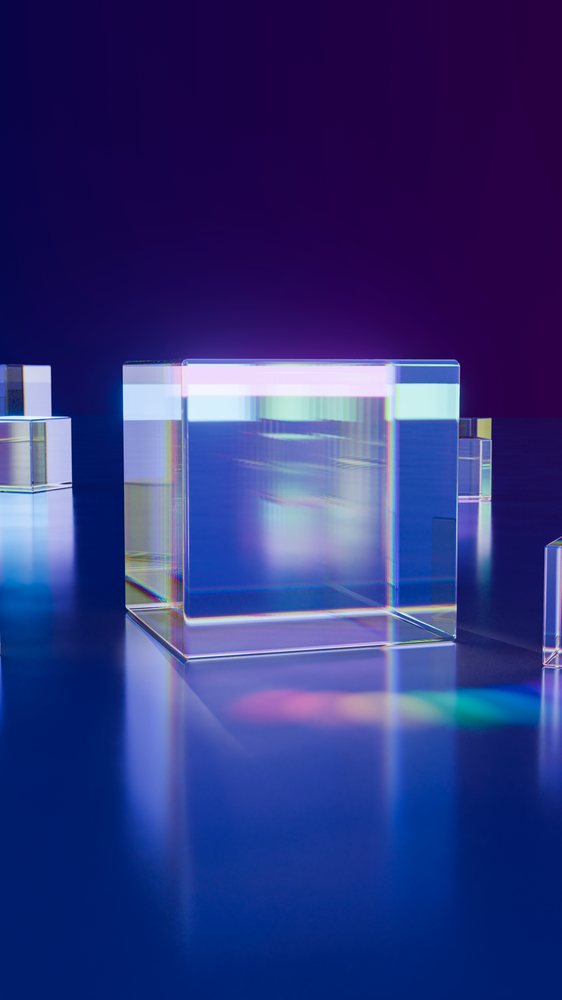 Transparent glass cubes refract colorful light on a reflective surface set against a blue gradient background in a digital illustration.