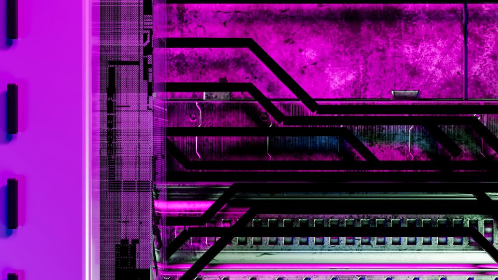 Close-up of a circuit board illuminated in purple light showing visible tracks, components, and a microchip.