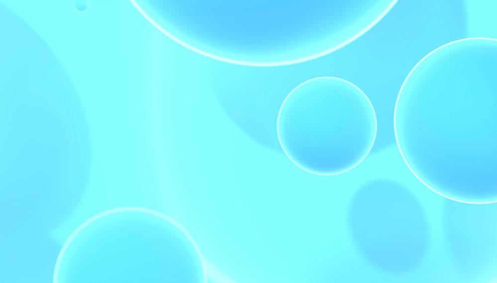 Blue transparent bubbles float against a glowing soft blue abstract background with smooth textures and light gradients.