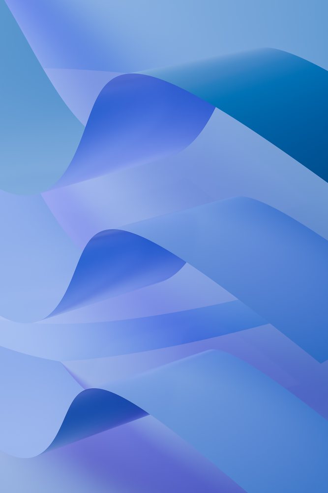 Abstract blue curved ribbon shapes flowing smoothly creating a modern artistic background.