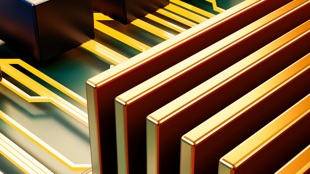 Close-up of an electronic circuit board showing golden circuitry and processor components.