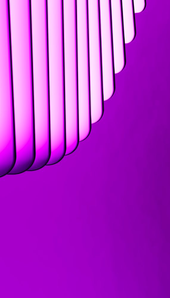 Pink fluorescent lights arranged vertically against a purple background creating an abstract modern design.