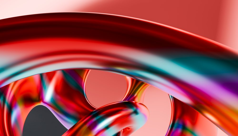 Colorful abstract 3D curved shapes with smooth, shiny surfaces on a red background.