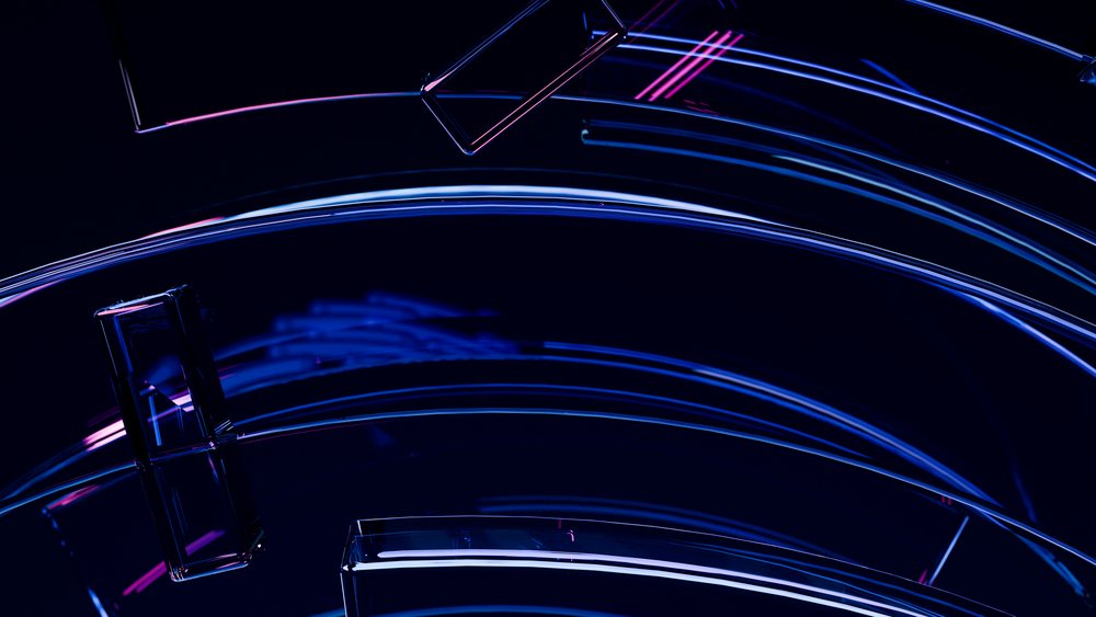 Curved neon lines in blue and purple glow against a dark background with reflections, forming a modern digital design.