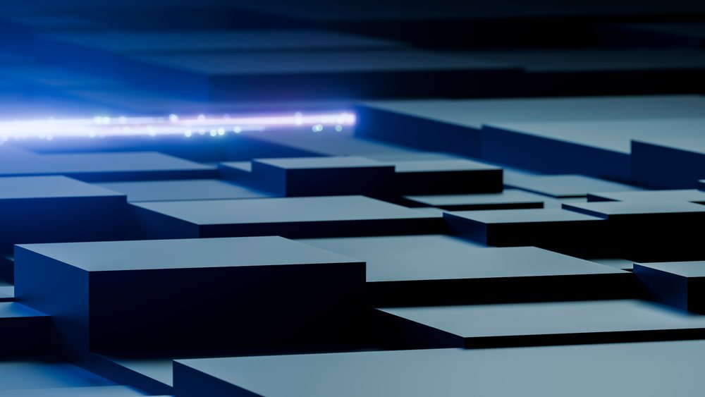 Close-up of computer hardware components illuminated by blue light in a technology environment, AI, compute, data center.