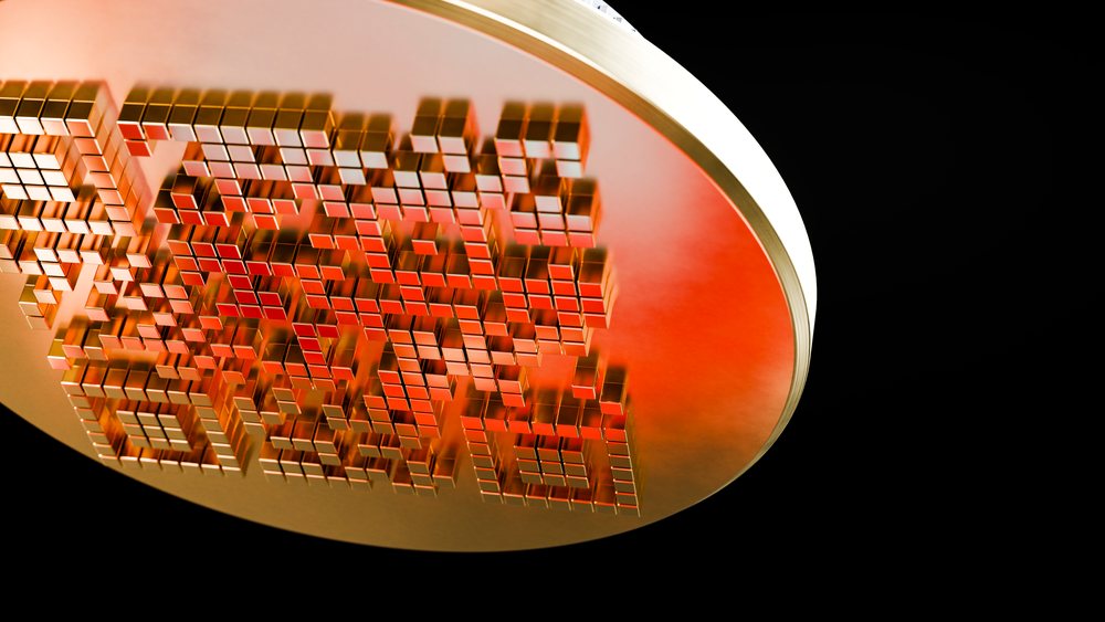 Golden disc with 3D cube QR code against a black background.