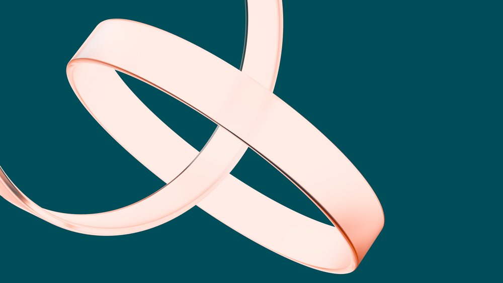 Two smooth, soft pink interlocking abstract rings form a minimalist geometric 3D illustration against a teal background.