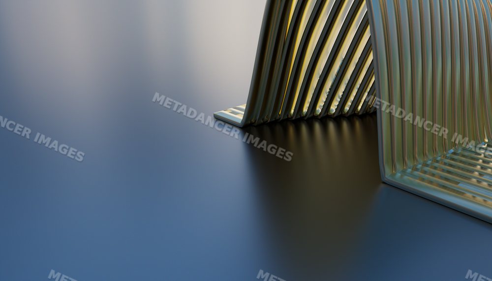 A close-up of a modern metallic abstract sculpture with geometric