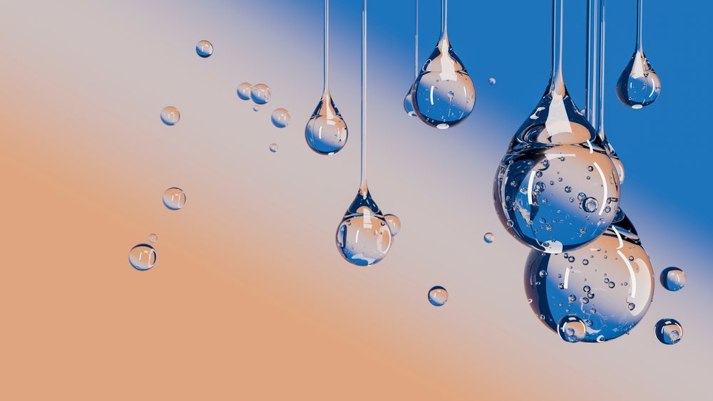 Illustration showing transparent water droplets hanging against a blue to orange gradient background.