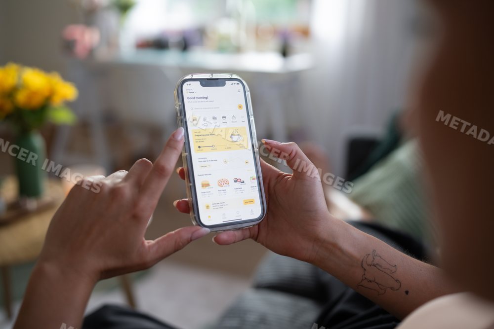 White Woman using a food ordering app