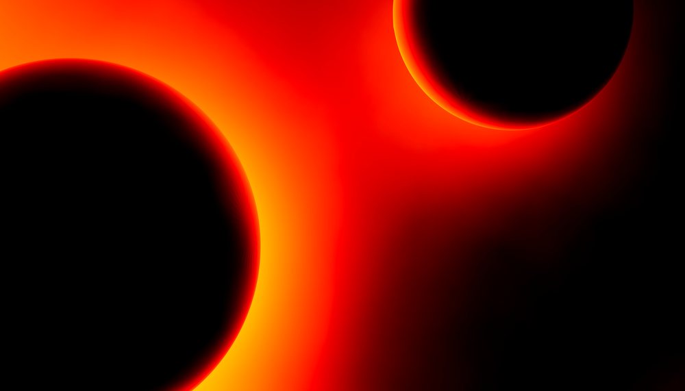 A digital illustration of a solar eclipse showing dark celestial bodies silhouetted against a glowing orange and red sun.