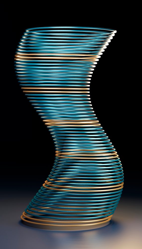 Abstract twisted spiral sculpture of smooth metallic blue and gold rings against a black background under studio lighting.