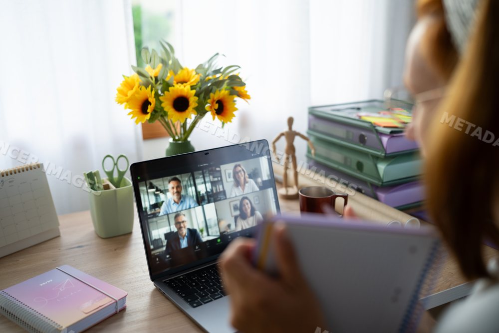 White Person attending a remote video call