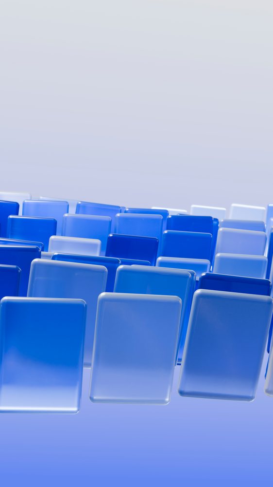 Blue glass squares arranged in repeating rows form an abstract geometric pattern over a blue gradient background.