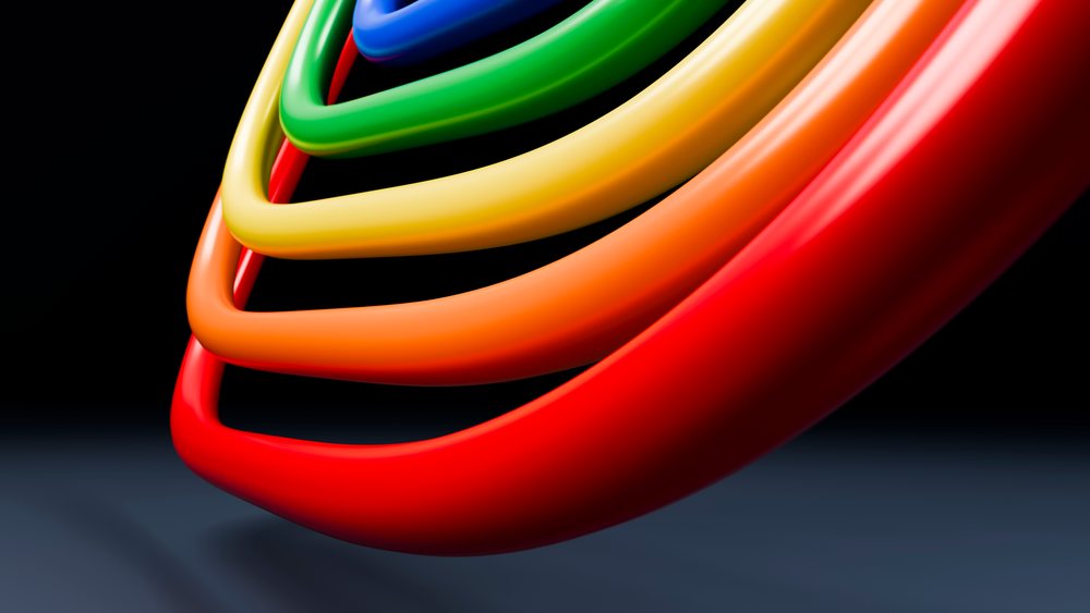 Digital 3D illustration of colorful concentric rings with a glossy finish and smooth curves on a black background.