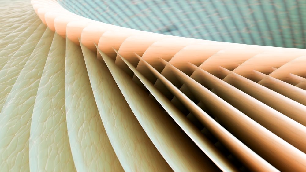 Abstract beige folded surface with layered curved textures and soft lighting forming a decorative geometric pattern.