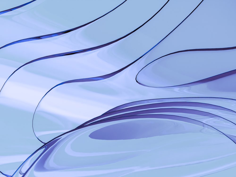 Close-up view of smooth, curved blue glass with reflective surfaces.