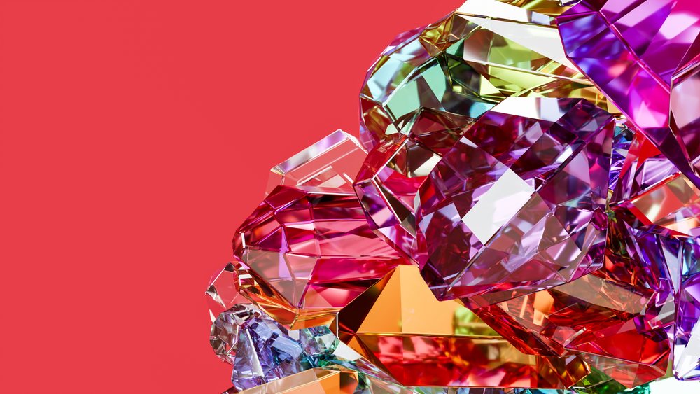 Colorful faceted gems clustered against a solid red background in a digital 3D illustration.