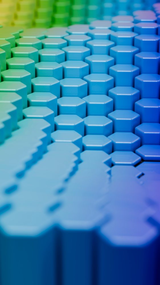 Close-up illustration of hexagonal blue and green blocks arranged in a 3D geometric pattern with a blue to green color gradient.