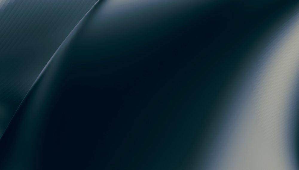 Abstract dark and light smooth gradient background with soft shadows and digital texture.