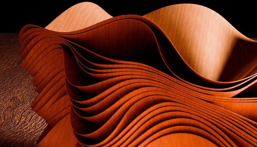 Curved and layered wooden sheets arranged in an abstract composition highlighting wood textures and natural grain.