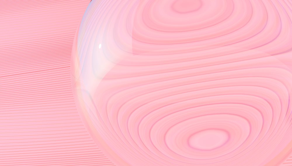 A smooth transparent pink glass sphere with soft circular patterns
