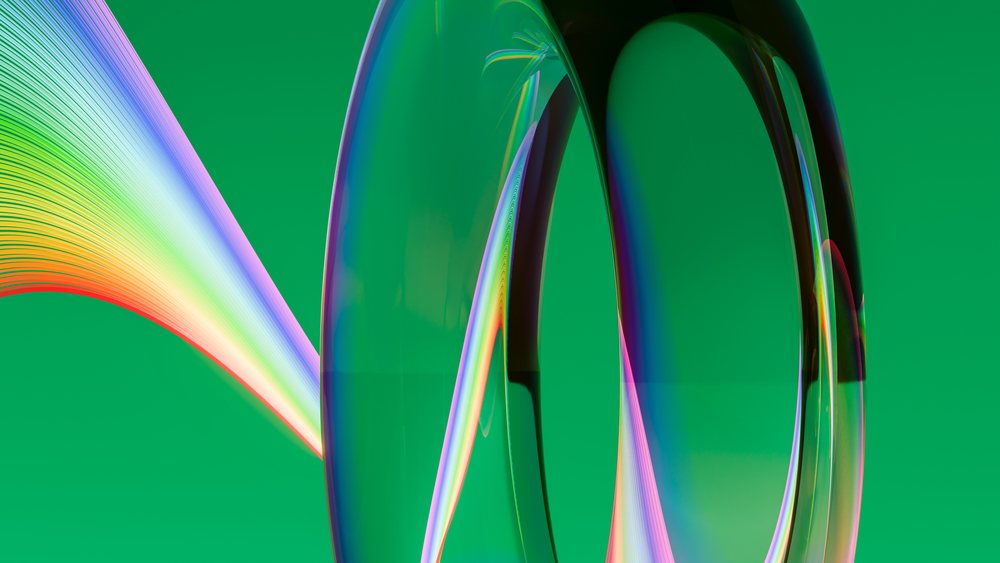 3D abstract rings with colorful light waves and rainbow reflections on a green background in digital art.