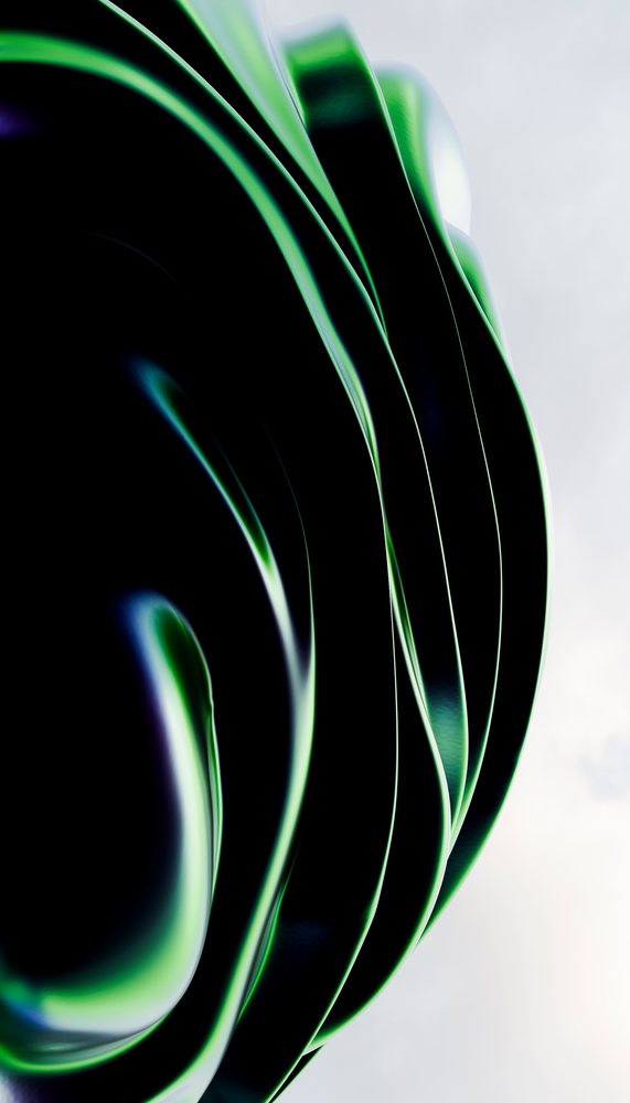 Close-up view of a large outdoor abstract sculpture featuring smooth, curved metallic surfaces with green highlights against a bright sky.