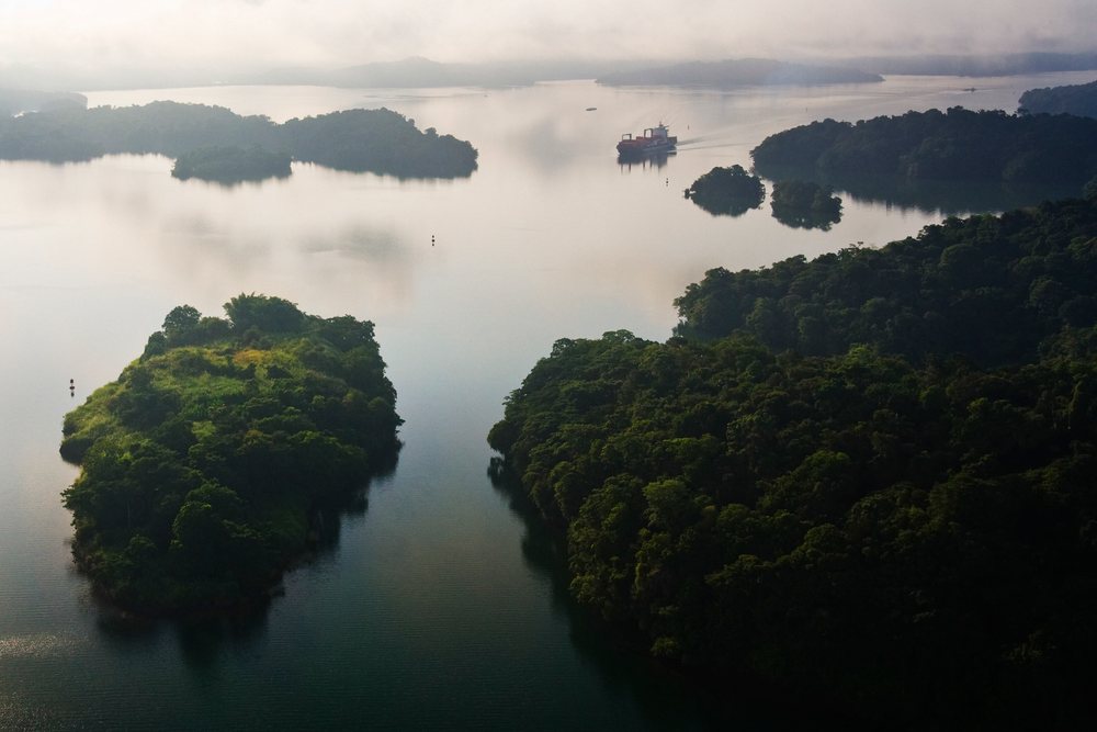 Container ship sailing on Lago Gatun, Panama Canal.