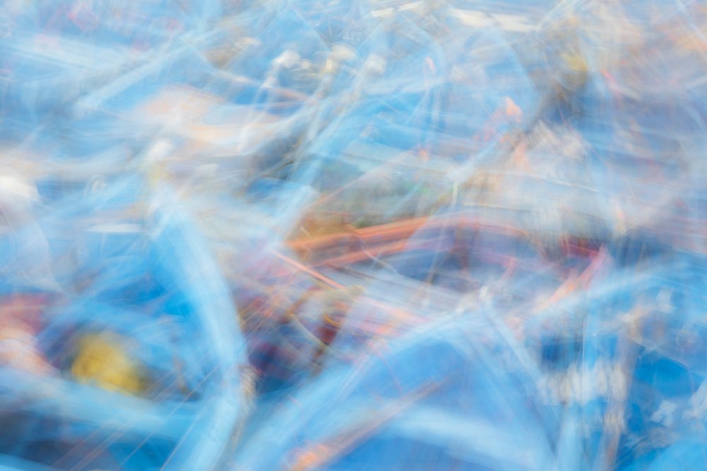 Rocking blue fishing boats with motion blur in Essaouira's coastal sea harbor, Landscape, Lifestyle, Essaouira Province, Morocco.