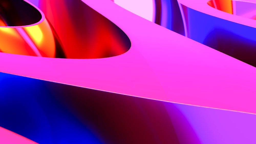 Colorful abstract curved shapes with smooth glossy surfaces and vibrant reflections.