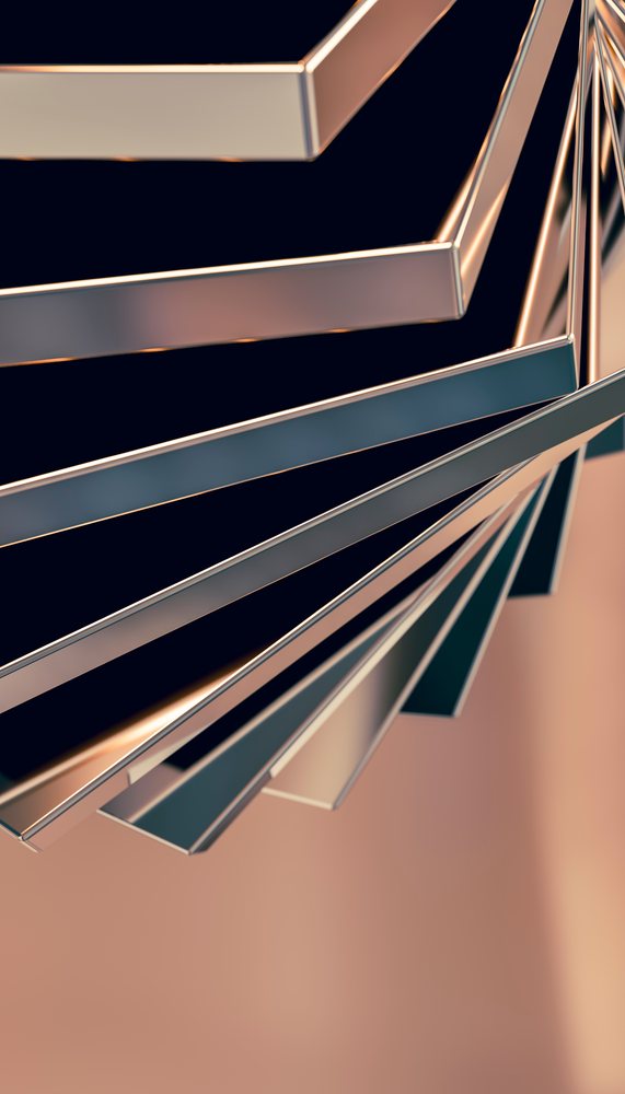 Close-up view of a modern abstract metal sculpture with reflective rectangular bars.