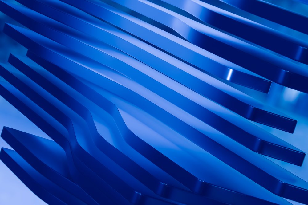 Blue layered abstract render featuring smooth curved shapes and shiny surfaces.