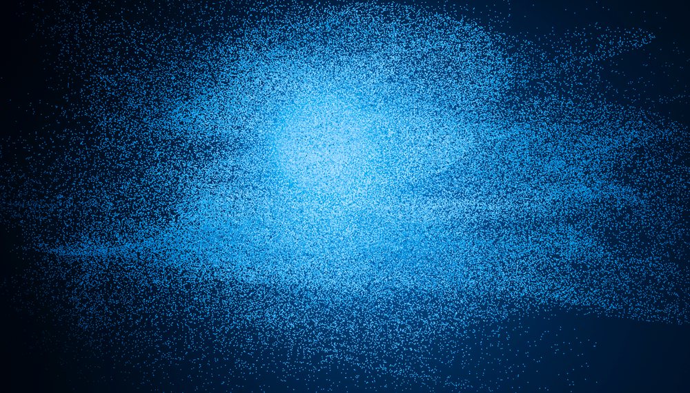 Blue digital particles scattered in an abstract glowing pattern on a dark background.
