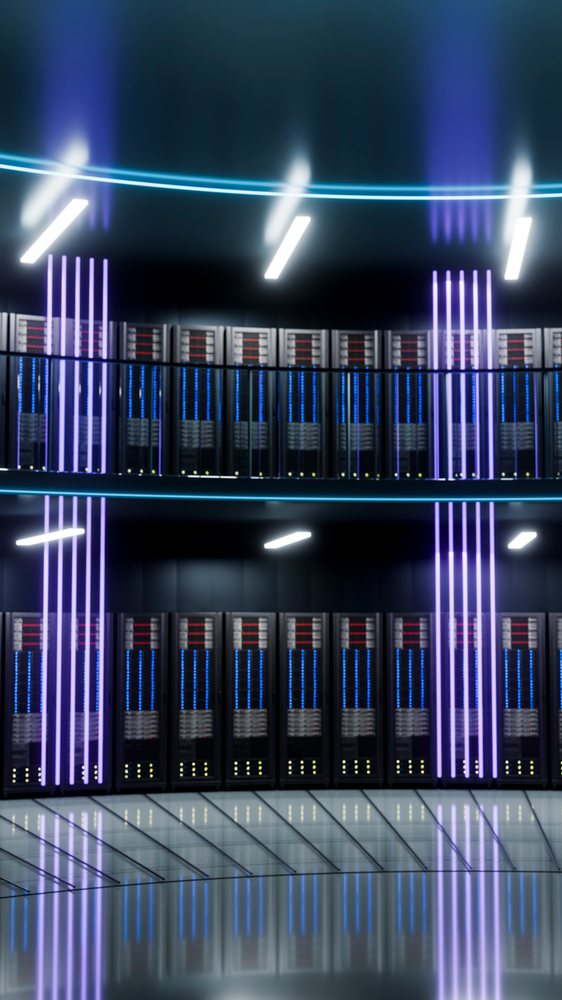 Interior of a modern data center with two rows of server racks.