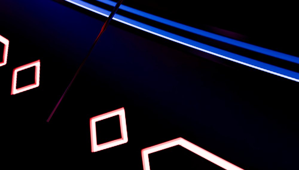 Clock face featuring glowing square shapes and a blue glowing line on a black background with clock hands.