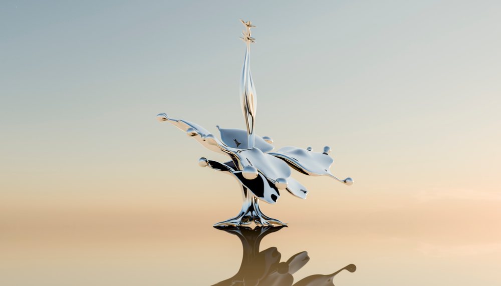 Silver liquid splash captured mid-motion on a reflective surface