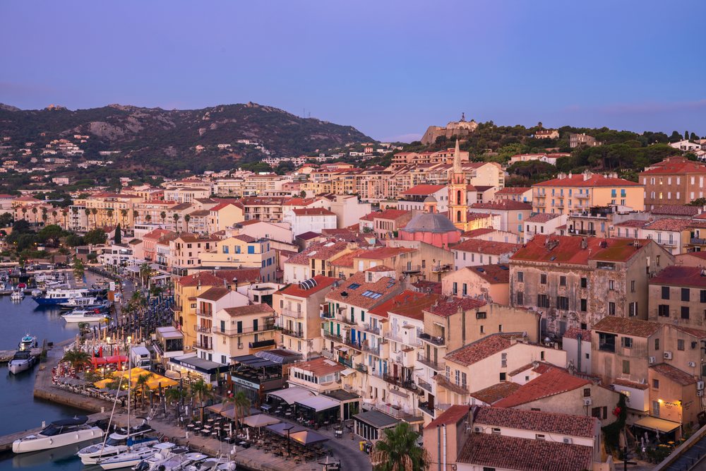 Harbour with boats and waterfront buildings viewed from the Citadel at Dawn, Travel Photography, Calvi, Corsica, France.