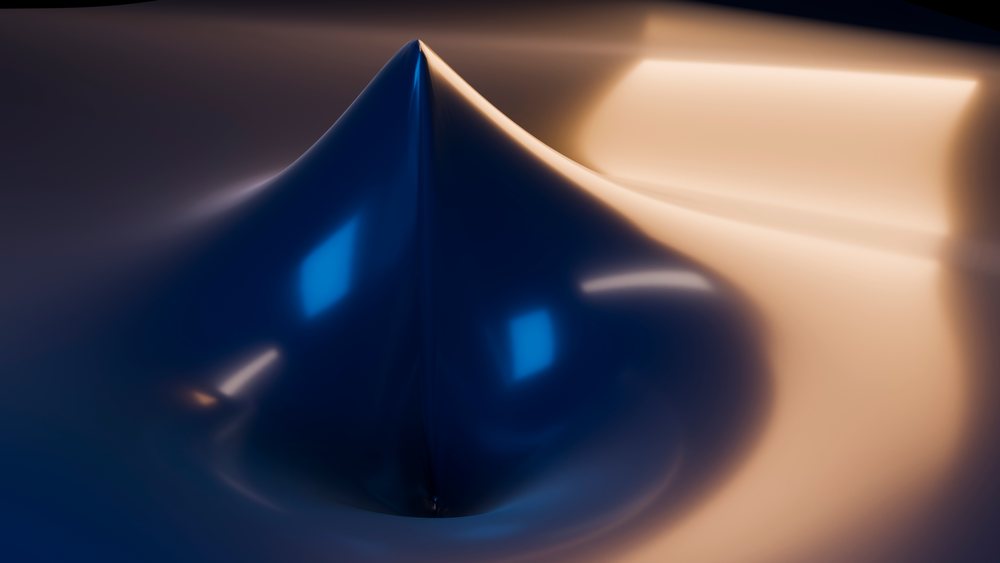 Blue viscous liquid forms a pointed peak with smooth reflections and dynamic fluid motion.