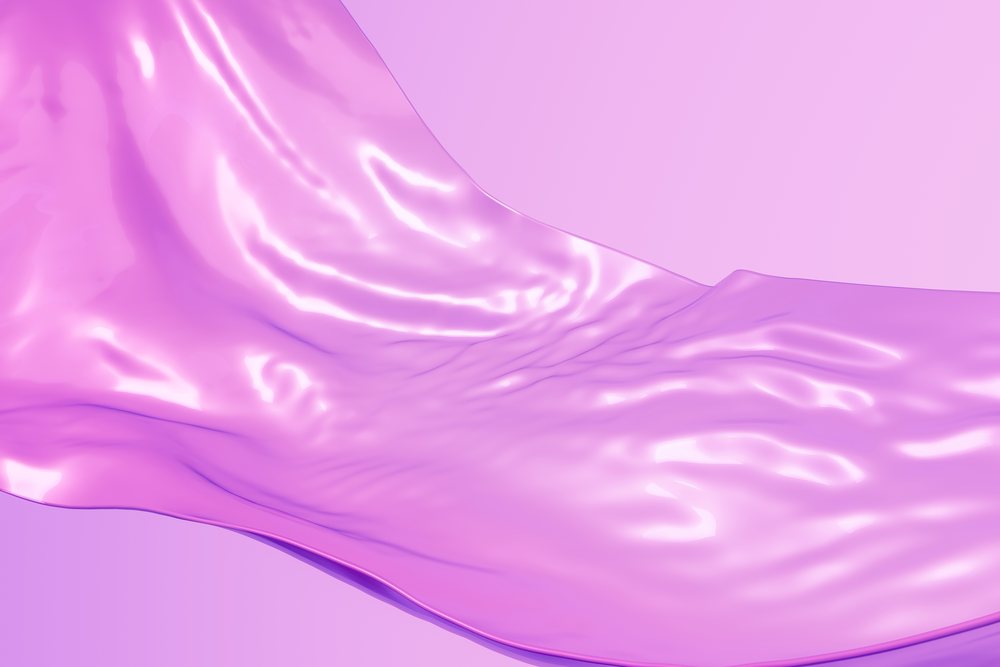 Abstract purple liquid with flowing fluid surface and shiny smooth texture on purple background.