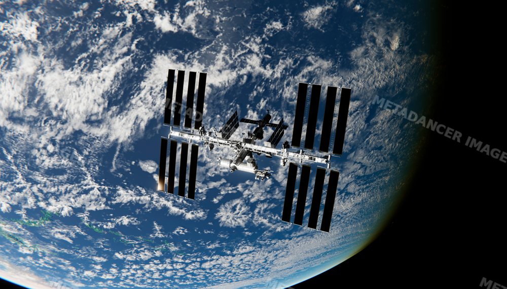 A space station orbits earth above clouds