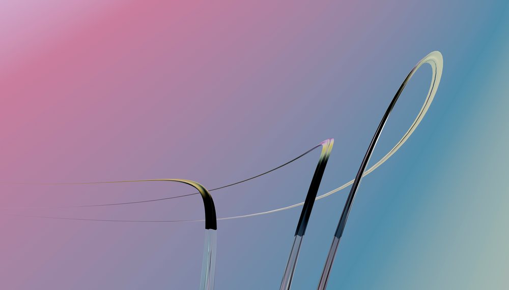 Abstract curved metal tubes with smooth flowing lines against a soft pink and blue gradient background.