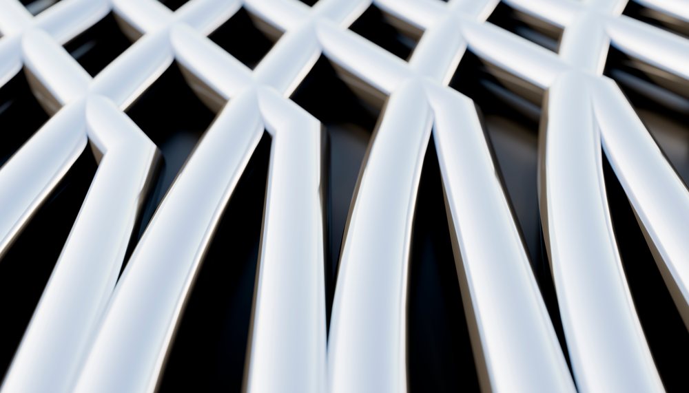 Metallic grid structure with shiny interconnected bars forming an abstract geometric pattern.