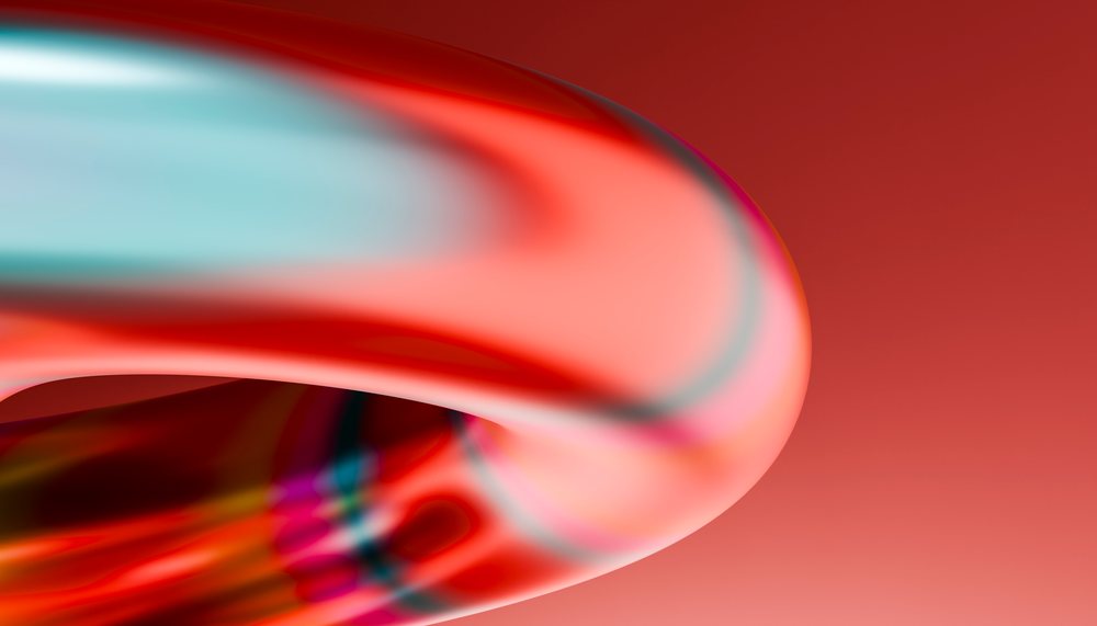 Abstract colorful smooth fluid-shaped digital artwork with gradient red background.