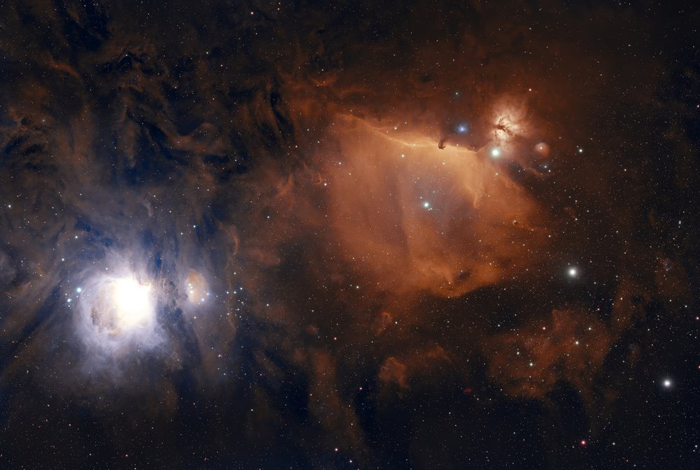 nebula with bright stars and interstellar dust clouds captured through astrophotography.