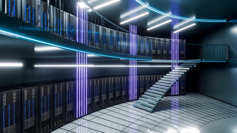 Modern data center interior featuring rows of black server racks with illuminated components and a floating staircase under blue and purple neon lights.