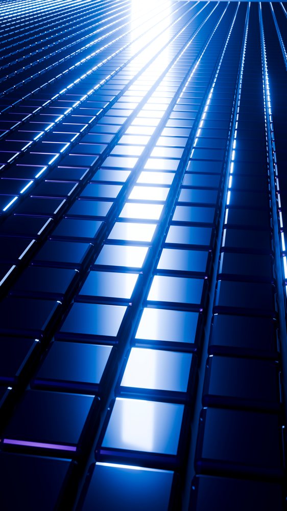 Reflective blue glass tiles with shiny texture form a modern abstract geometric pattern.