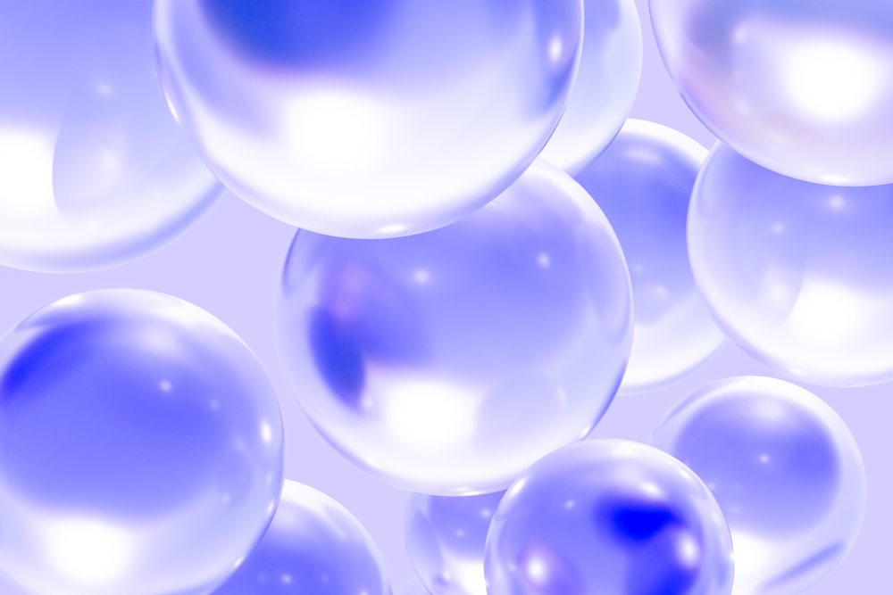 Multiple transparent purple spheres float on a soft lavender background in a modern digital abstract design.